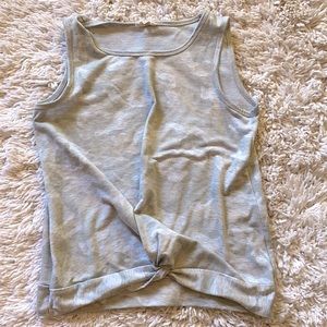 June and Drlanccy size Small tank top in a light Camo pattern